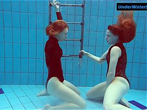 2 steaming teenagers underwater